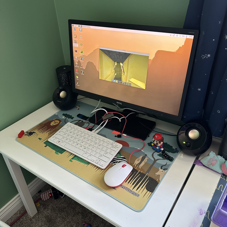 A Raspberry Pi 400 keyboard computer set up for the family